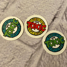 Load image into Gallery viewer, Team Toxic 1” Tiny Round Stickers (pack of 3)
